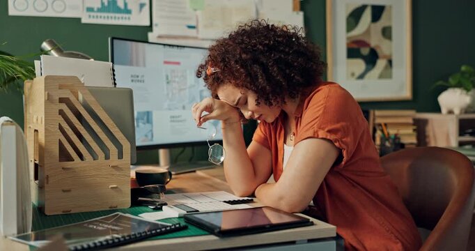 Tired, woman and designer in office for burnout, glasses and eye strain for online graphic artist. Technology, overworked and project for deadline, headache and creative block or problem in workplace