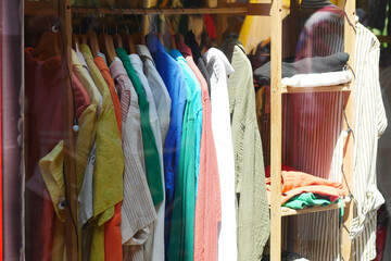 A Vibrant and Colorful Clothing Display Showcased in the Storefront of a Boutique