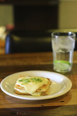 lemon cream and sparkling water puff pastry with a slice of lemon 