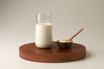 a milk carton and nutritional powder