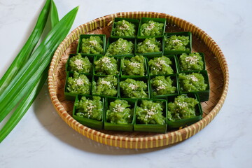 Pandan sticky rice desserts in bamboo woven 