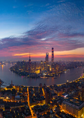Obraz premium Aerial view of modern city skyline and buildings at sunrise in Shanghai