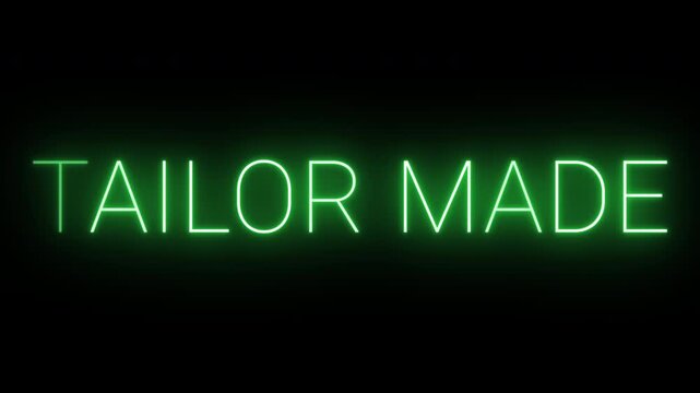 Flickering neon green glowing tailor made text animated on black background