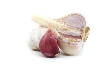 Garlic bulbs of varying sizes isolated on white background