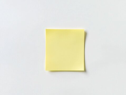 A single yellow sticky note on a white background