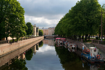 View of the embankment of the Griboyedov Canal and Sadovaya Street from the Krasnogvardeisky Bridge on a sunny summer day, Saint Petersburg, Russia