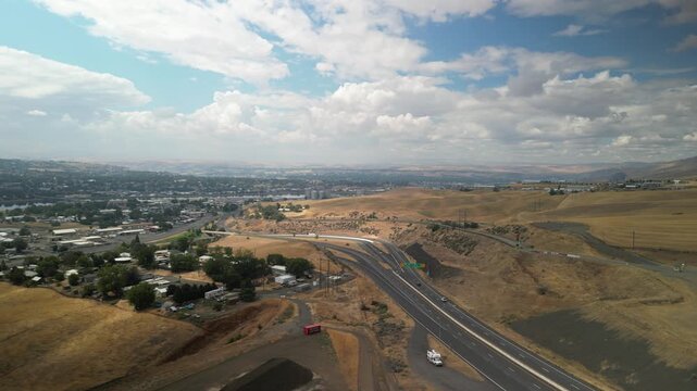 Wide aerial of Lewiston Idaho on smoky day from hills and highway 95