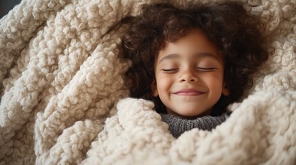 Embracing Childhood Comfort - Happy Child Snuggling with Soft Throw for Warmth and Joyful Moments