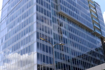 Architectural details of tall buildings and structures close-up.