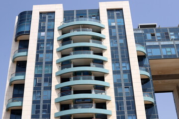 Architectural details of tall buildings and structures close-up.