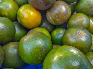 fresh oranges in the market. Close-up view