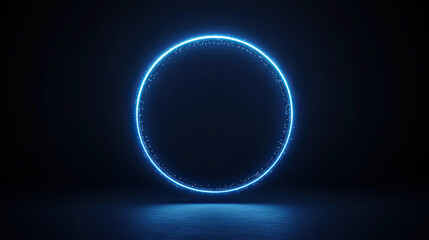 Obraz premium A glowing blue circle in a dark background, representing modern technology and digital aesthetics.