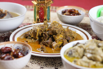 Selective focus of Rendang is traditional food from Minang Tribe, West Sumatera, Indonesia. Made from Beef Stew and Coconut Milk with Various Herbs and Sice