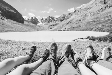 Families foots in the mountains, black and white toned image 