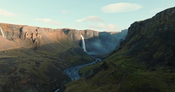 Haifoss Waterfall Flowing Through The Rugged Cliffs