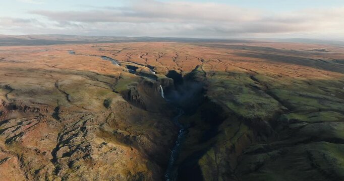Tranquil Landscape Of Fossardalur Valley And Flowing River