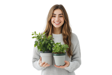 happy young woman standing holding potted plants on a transparent background