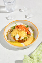Poached Egg and Salmon on Brioche with Hollandaise Sauce - Gourmet Brunch Dish