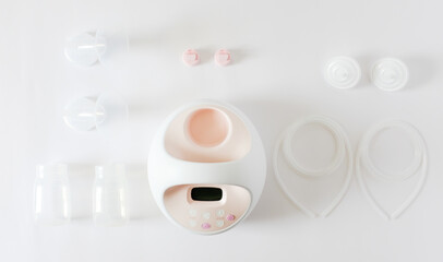 Breast Pump Supplies On White Backdrop