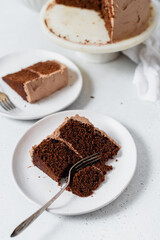 Chocolate cake servings on a white tabletop