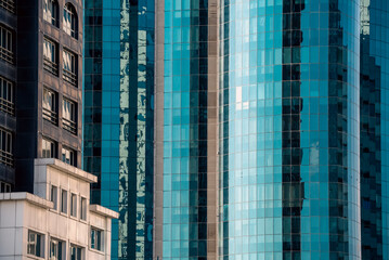 Fototapeta premium many windows and walls facade of a modern skyscraper without people