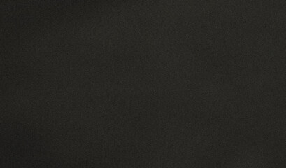 Dark grainy surface on an abstract background
