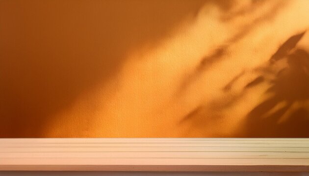 Fondo de estudio fotogr&aacute;fico para mockup con pared naranja y una tabla de madera, sombras