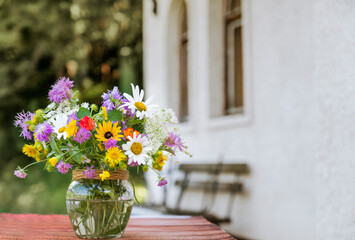 Beautiful Wild Summer Flowers in a Small Vase 