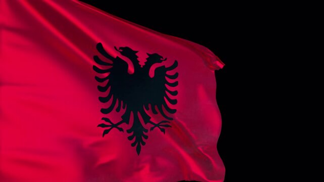 Detailed close-up of the albania flag fluttering in the wind, transparent background, seamless loop, 30 fps, slow motion animation possible	