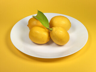 lemons in a dish