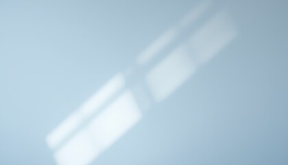 Abstract Light and Shadow on Blue Wall.