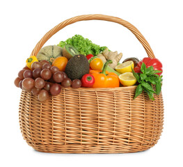 Many different fruits and vegetables in wicker basket isolated on white