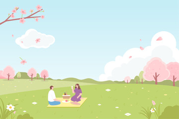 A couple enjoys a picnic in a cherry blossom garden