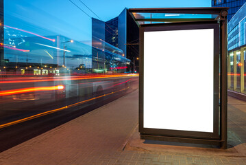 Bus Stop Billboard Mockup For Advertising Street Poster Or Banner In The City At Night. Commercial Outdoor Lightbox With Blurred Car Light Trails