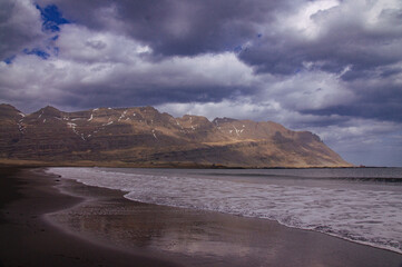 Iceland Landscape with ocean, mountains, coast, sky and clouds