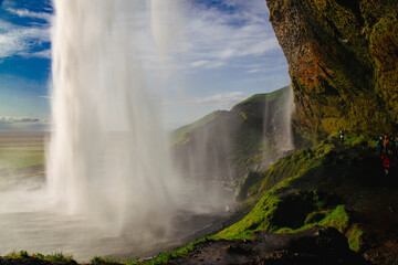 Behind a Waterfall in Island - Waterfall with Mountains, Sky and Clouds