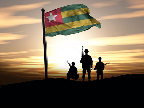 Togo Independence Day, Togo flag with soldiers. Photo Illustration