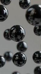 a group of black balls floating in the air