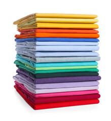 Stack of clean colorful t-shirts isolated on white