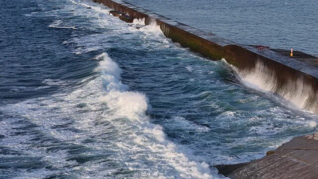 Waves crashing at the coast at Donibane-Lohizune-Saint Jean de Luz, Basque Country.