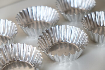 Close up of baking utensils. Pie and cake molds. Kitchen tools.