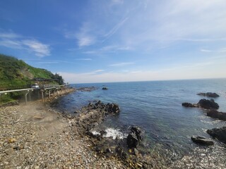 바다 하늘 섬 해안 구름 파란하늘 해안가 모래사장 바위 기암괴석