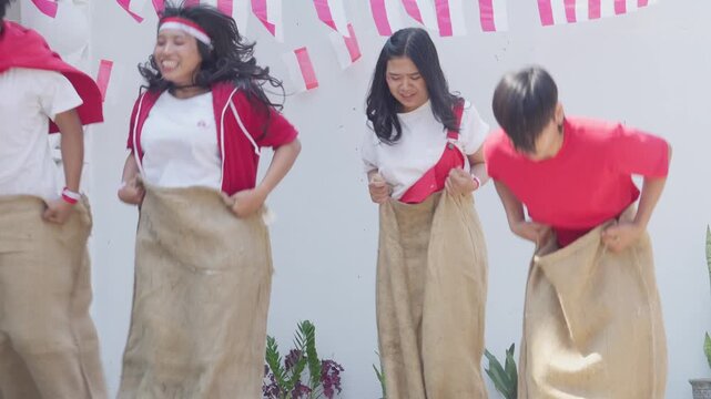 Young Asian People, Compete Sack Race During Indonesian Independence Day Called Balap Karung