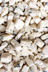 4K image of Slices of Assorted Manchego Cheeses from Above, Showcasing the Rich Texture and Flavor Profiles of This Spanish Delicacy