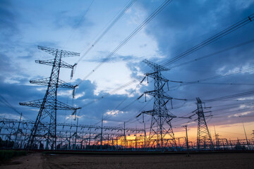 The pylons are in the evening, Substation in the evening, High voltage substation and beautiful sunset glow