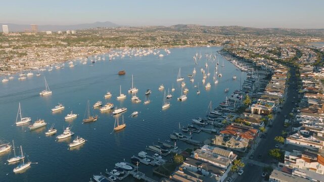 Breathtaking aerial view of Newport Beach, California showcasing marina, boats, and coastal homes