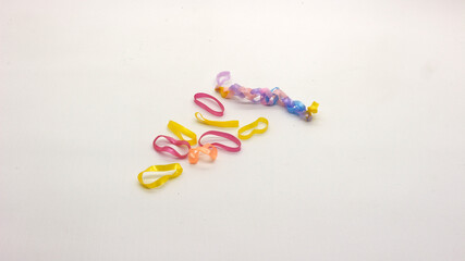 Fototapeta premium Colorful hair ties isolated