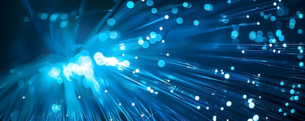 Fototapeta premium Abstract blue fiber optic light burst, representing futuristic technology and high-speed data transmission.