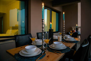 Dinner Table in Terrace Pearl Qatar Porto Arabia. Candle light dinner 