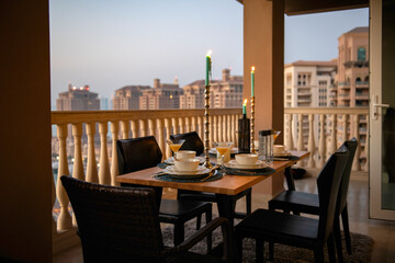 Dinner Table in Terrace Pearl Qatar Porto Arabia. Candle light dinner 